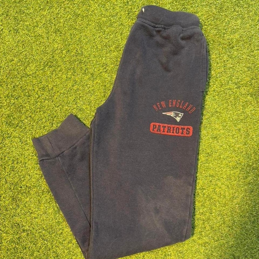 New England Patriots team apparel sweatpants.